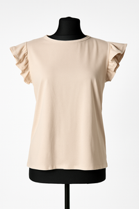 Sieviešu krekls ar volāniem – vieglums, kas piešķir eleganci