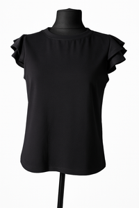 Sieviešu krekls ar volāniem – vieglums, kas piešķir eleganci