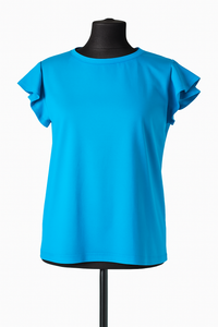 Sieviešu krekls ar volāniem – vieglums, kas piešķir eleganci